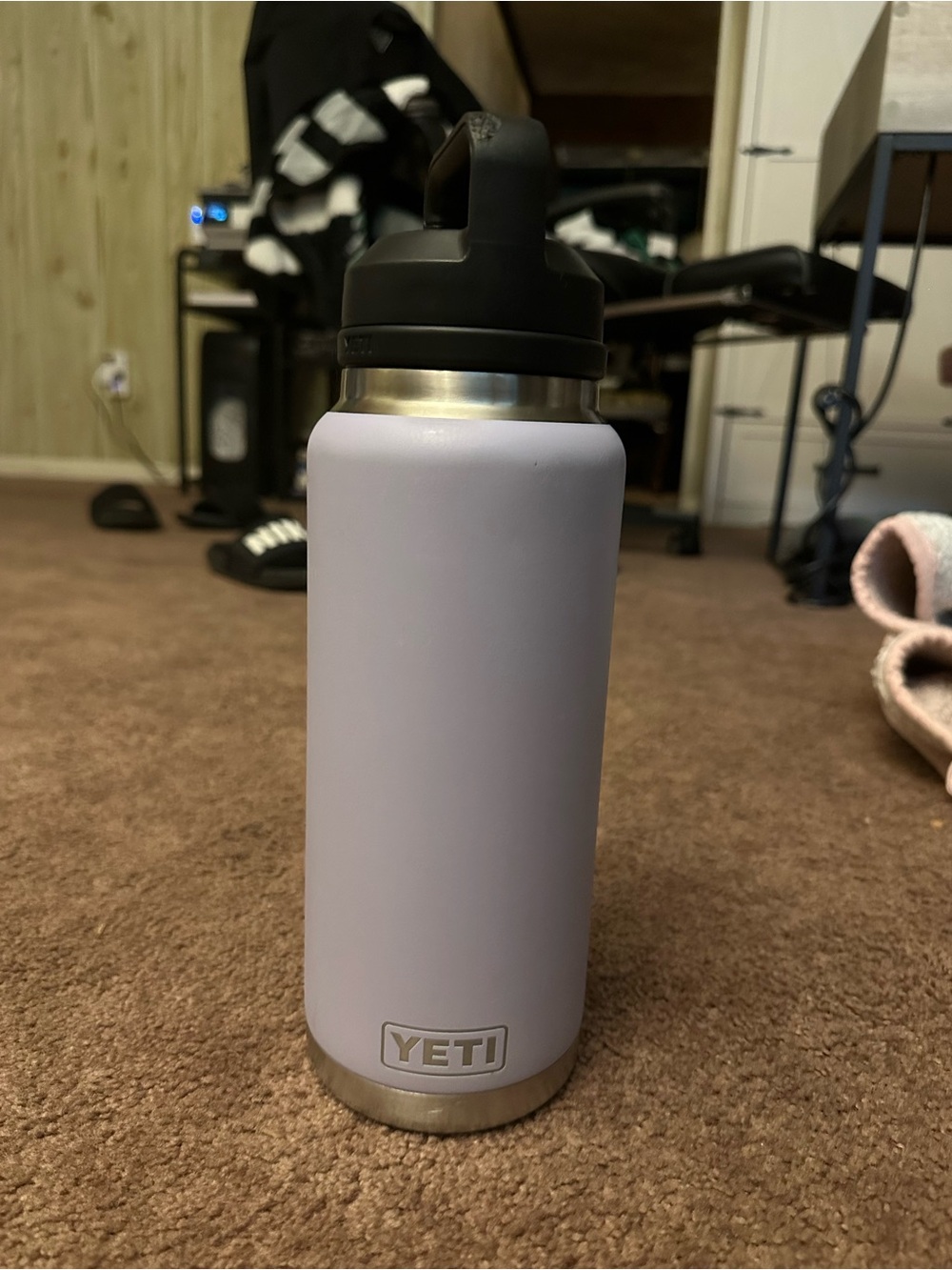 lilac Yeti Rambler water bottle with a black chug cap.